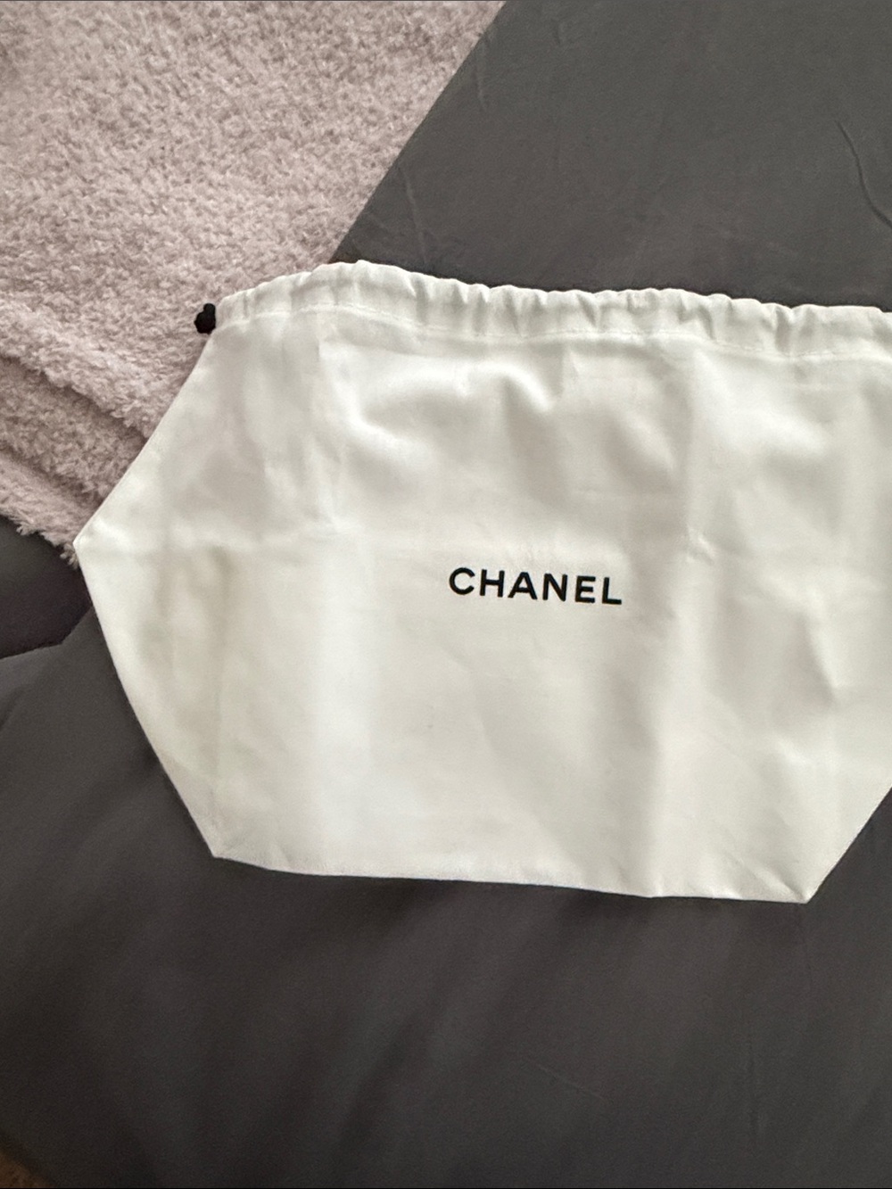 CHANEL White Dust Pouch with Black Logo